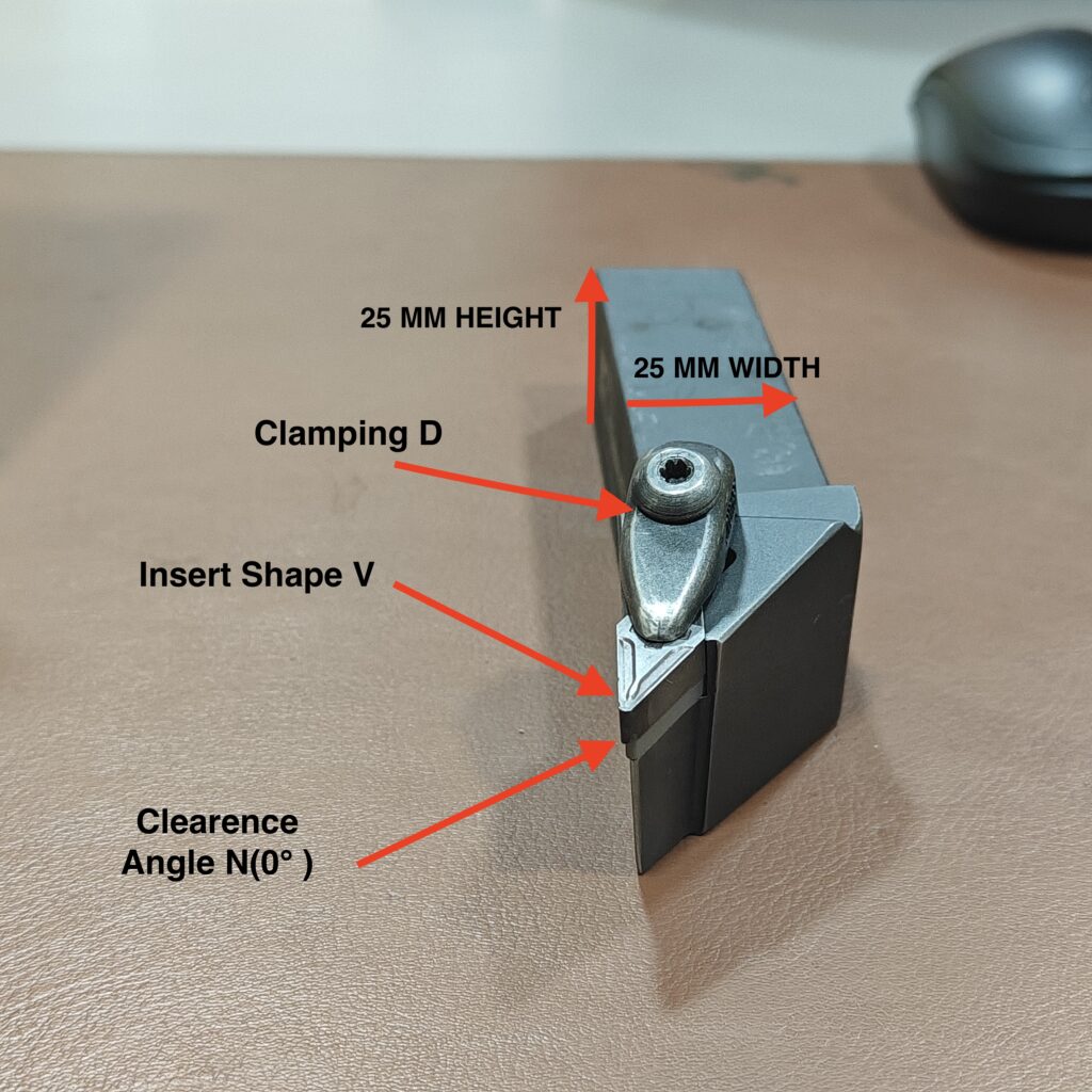 Close-up of a DVJNL-2525M16 CNC turning tool holder with a 35-degree diamond carbide insert, labeled to show clamping method, insert shape, clearance angle, and 25mm square shank dimensions.